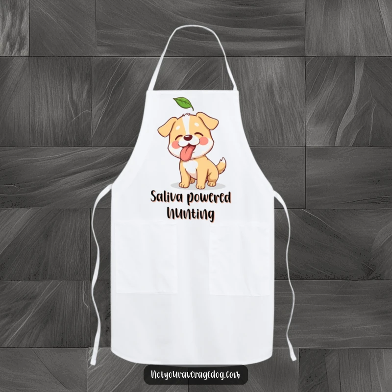Funny apron showing a dog's comical attempt to catch a leaf while cooking or baking.